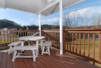 Pigeon Forge Chalet featuring outdoor Covered dinning area Little Pigeon River
